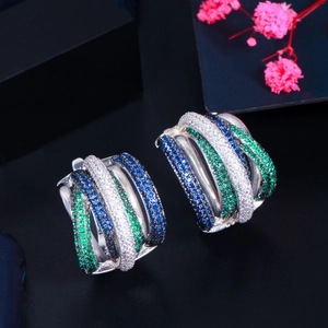 Detail of multi-layer hoop earrings with blue, green and white zircon inlays