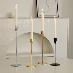 Set of four minimalist tall metal candle holders in gold, silver, rose gold and matte black