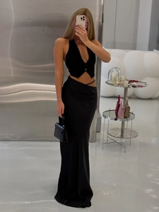 Ensemble chic deux pièces noir avec gilet dos nu et jupe longue moulante taille haute