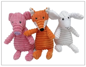 Detail view of corduroy texture on plush dog toys featuring pig, fox and sheep designs