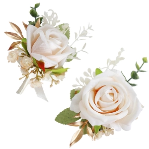 Elegant set of two cream rose boutonnieres with gold leaves and white silk ribbons