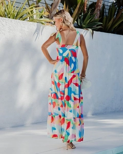 Detail of summer sundress with geometric print featuring elastic ruched back and tie straps