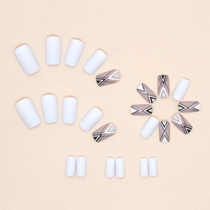 Matte long square press-on nails with white geometric patterns and silver glitter details