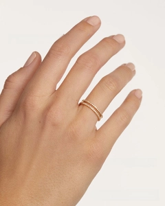 Close-up of double-layer S925 silver ring with shimmering pavé diamonds on a hand