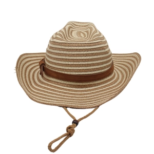 Detail of the woven texture and brown leather band on the striped straw cowboy hat