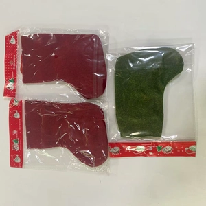 Three-piece Christmas stocking set in red and green felt with convenient hanging loops
