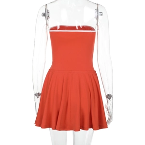 Back view of red tube top mini dress with white piping on a clear mannequin