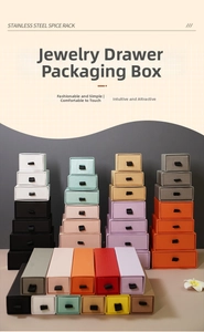 Multi-colored drawer-style cardboard jewelry boxes with elegant black ribbon handles