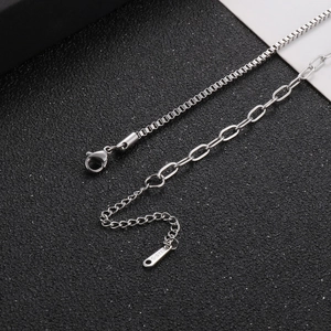 Silver stainless steel double chain necklace with engraved round pendant and lobster clasp