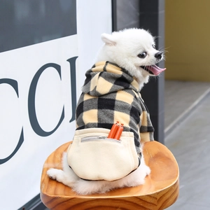 Detail of pet hoodie with yellow plaid pattern and back zipper pocket for dog snacks