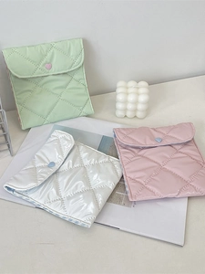 Quilted nylon sanitary pouch with heart button in green, white and pink colors