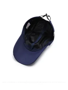 Detail view of the breathable lining and adjustable buckle of this quick-dry baseball cap
