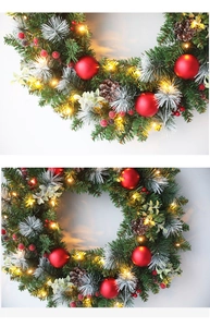 Detail of Christmas wreath with red ornaments, natural pine cones and warm LED lights