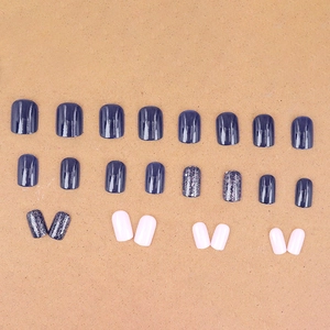 Starry dark blue and purple glitter press-on nails set with 24 pieces in round shape
