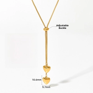 Detail of gold double heart necklace with 48+5cm chain and adjustable sliding bead