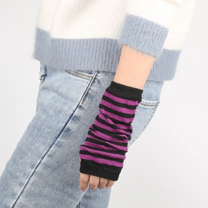 Close-up of black and purple striped knitted arm warmers with a fingerless design