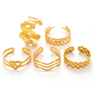 Five-piece set of gold butterfly and heart adjustable open rings with textured details