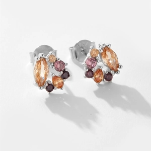 Macro detail of S925 sterling silver studs with colorful marquise and round zircon stones