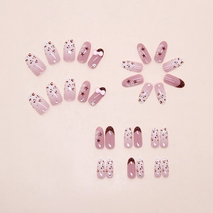Detail of red brown leopard print fake nails with bow knots and sparkling rhinestones