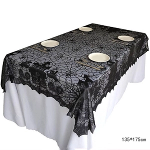 Detail of 135x175cm black lace Halloween tablecloth featuring spider web and bat patterns