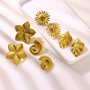 Golden stainless steel earring set featuring sun, flower, shell, and leaf textured designs