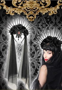 Detail of Gothic bridal headband with black roses, red gem and long lace veil