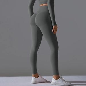 Detailed back view of dark grey seamless yoga pants with high waist and scrunch butt lift