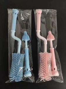Blue and pink silicone baby bottle and nipple brush sets with 360-degree rotating handles
