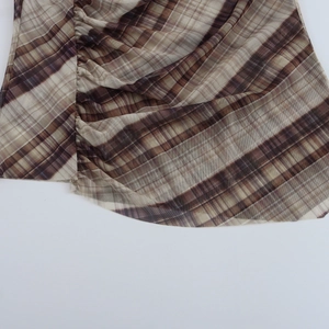 Plaid mesh long sleeve top with elegant side ruching and diagonal neckline detail