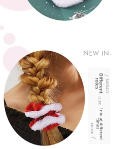 Detail of red sequin bow scrunchie with white plush trim on blonde braided hair