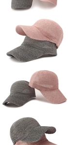 Detailed view of pink and grey knitted sequins baseball caps with breathable mesh texture