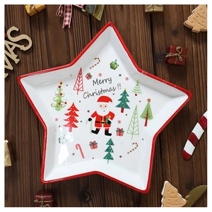 Star-shaped ceramic Christmas plate with festive Santa and tree illustrations