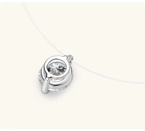 Macro view of S925 sterling silver mermaid tear pendant with sparkling round cut crystal