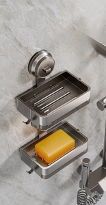 Close-up of double-layer space aluminum soap holder with suction cup and drain slots