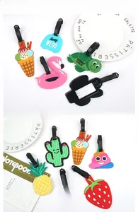 Detailed view of colorful cartoon silicone luggage tags with contact info cards and straps