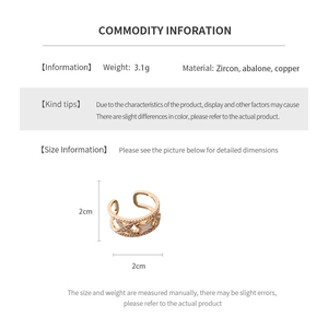 Detailed view of zircon and abalone shell ring with 2cm dimensions and 3.1g weight info