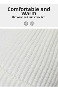 Detailed close-up of white ribbed knit fabric texture showing warm soft wool fibers