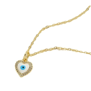 Golden heart necklace with evil eye pendant and white zircon stones on white background