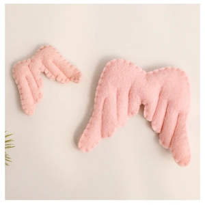 Pink felt angel wing DIY accessories for handmade Christmas decorations and crafts