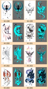 Luminous blue Halloween temporary tattoos featuring butterfly, moon, and star designs