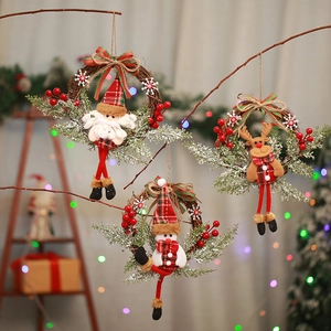 Christmas wreath set with Santa, snowman and reindeer figures on rustic rattan rings