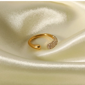 Detailed view of 18k gold plated open ring with sparkling white pavé rhinestones