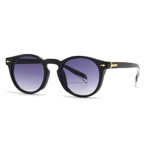 Retro round black sunglasses with purple gradient lenses and gold arrow studs