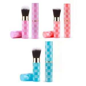 Portable retractable makeup brushes with checkerboard patterns in pink, red, and teal