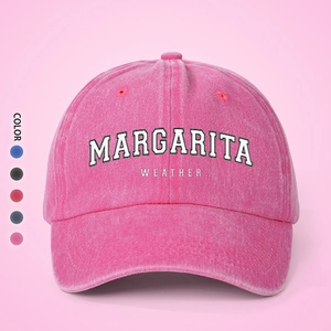 Detail view of pink washed cotton baseball cap with Margarita Weather text print