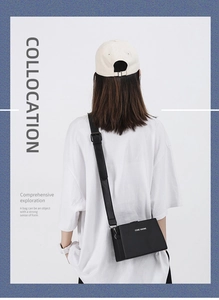 Classic black leather-style crossbody box bag shown on model for a trendy casual style