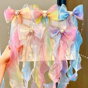 Five colorful gradient organza hair bows with gold edges and pearl accents for girls