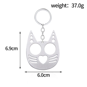 Cat-shaped metal self-defense keychain with dimensions 6.9cm by 6.0cm and 37g weight