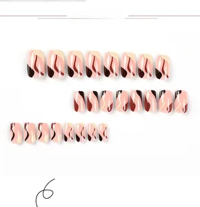 Detailed set of 24 press-on nails with brown abstract fluid wave lines on glossy finish