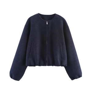 Navy blue women's pilot jacket featuring front zipper, side pockets and elastic hem details